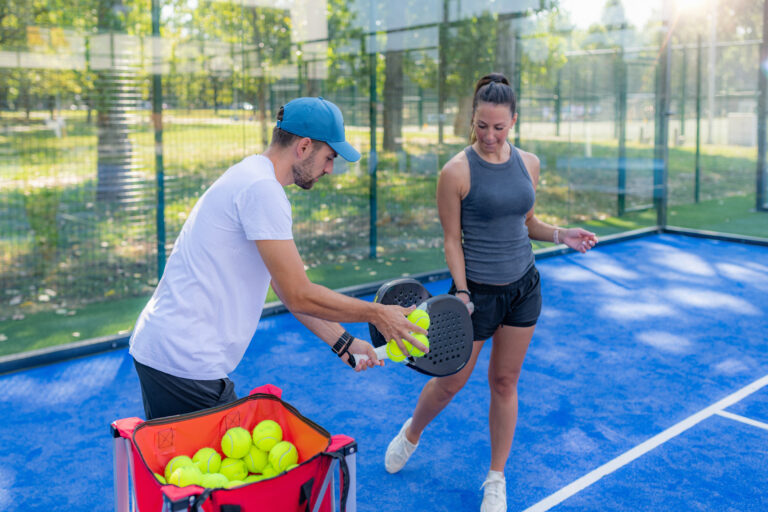 People playing padel on outdoor court